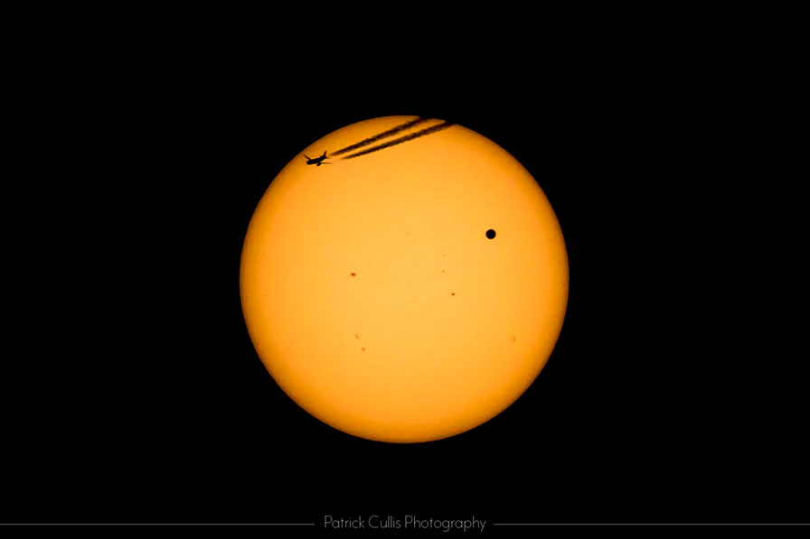 An airplane joins the planet Venus during the 2012 Transit of Venus.