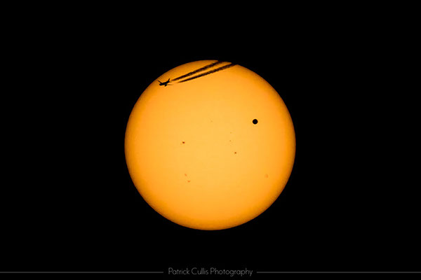 An airplane joins the planet Venus during the 2012 Transit of Venus.