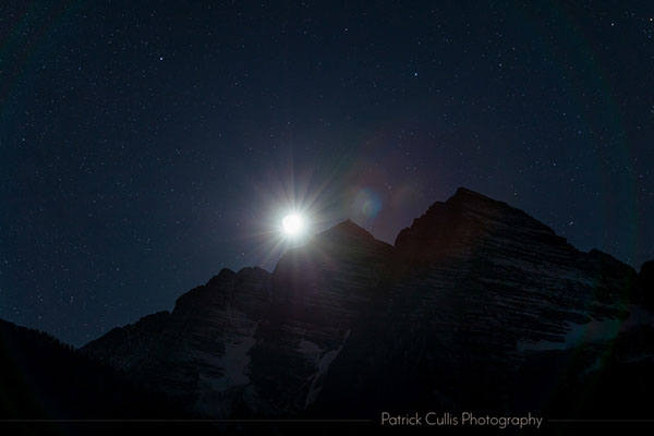 The moon setting behind the Maroon Bells by Patrick Cullis
