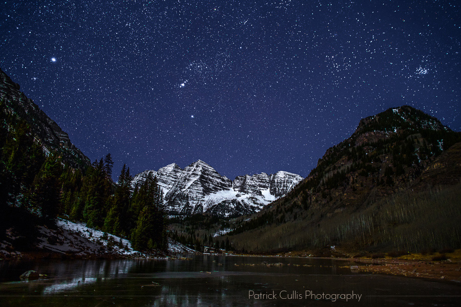 The constellation of Orion above the Maroon Bells in November by Patrick Cullis