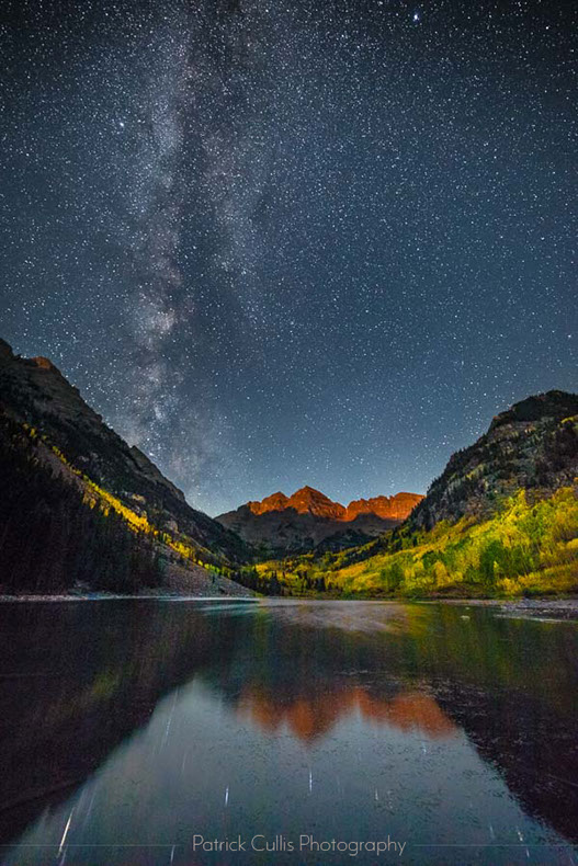 Moonrise illuminates the Maroon Bells with the Milky Way in Fall by Patrick Cullis